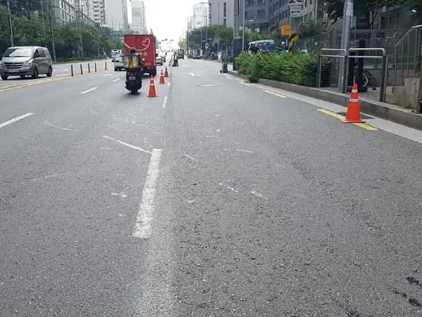 전용 흑색골재 살포